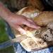 Samples of bread are cut during the Cobblestone Farm Farmers Market on Tuesday, May 21. Daniel Brenner I AnnArbor.com
